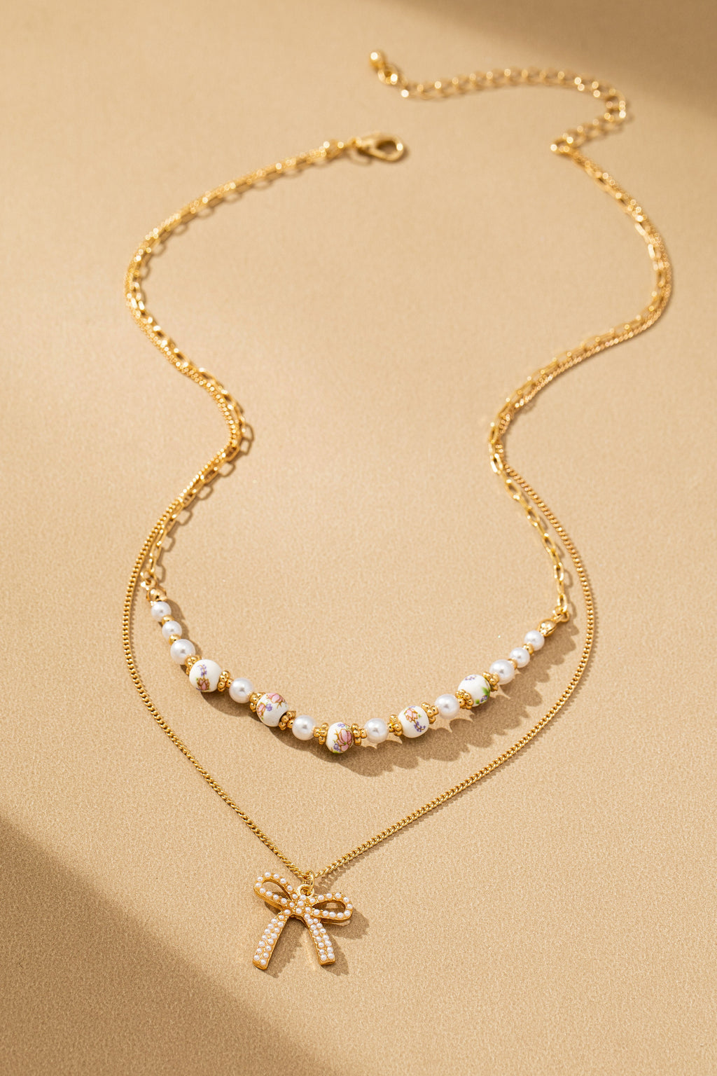 Rosy Ceramic Pearl & Bow Layered Necklace