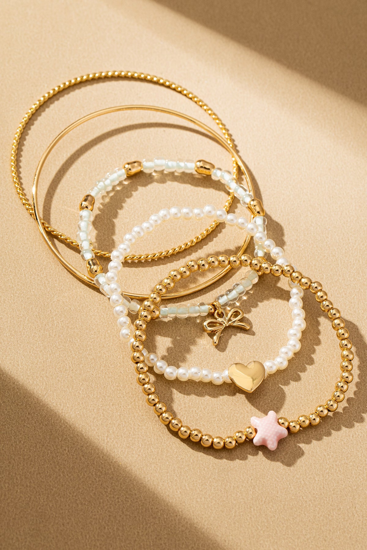 Set of 5 Ceramic Fish, Heart & Bow Bracelets